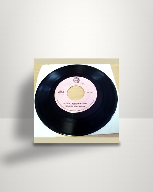 Fernest Arceneaux – Last Night / I'm On My Way Back Home - 7" - Mardi Gras Records US 1994